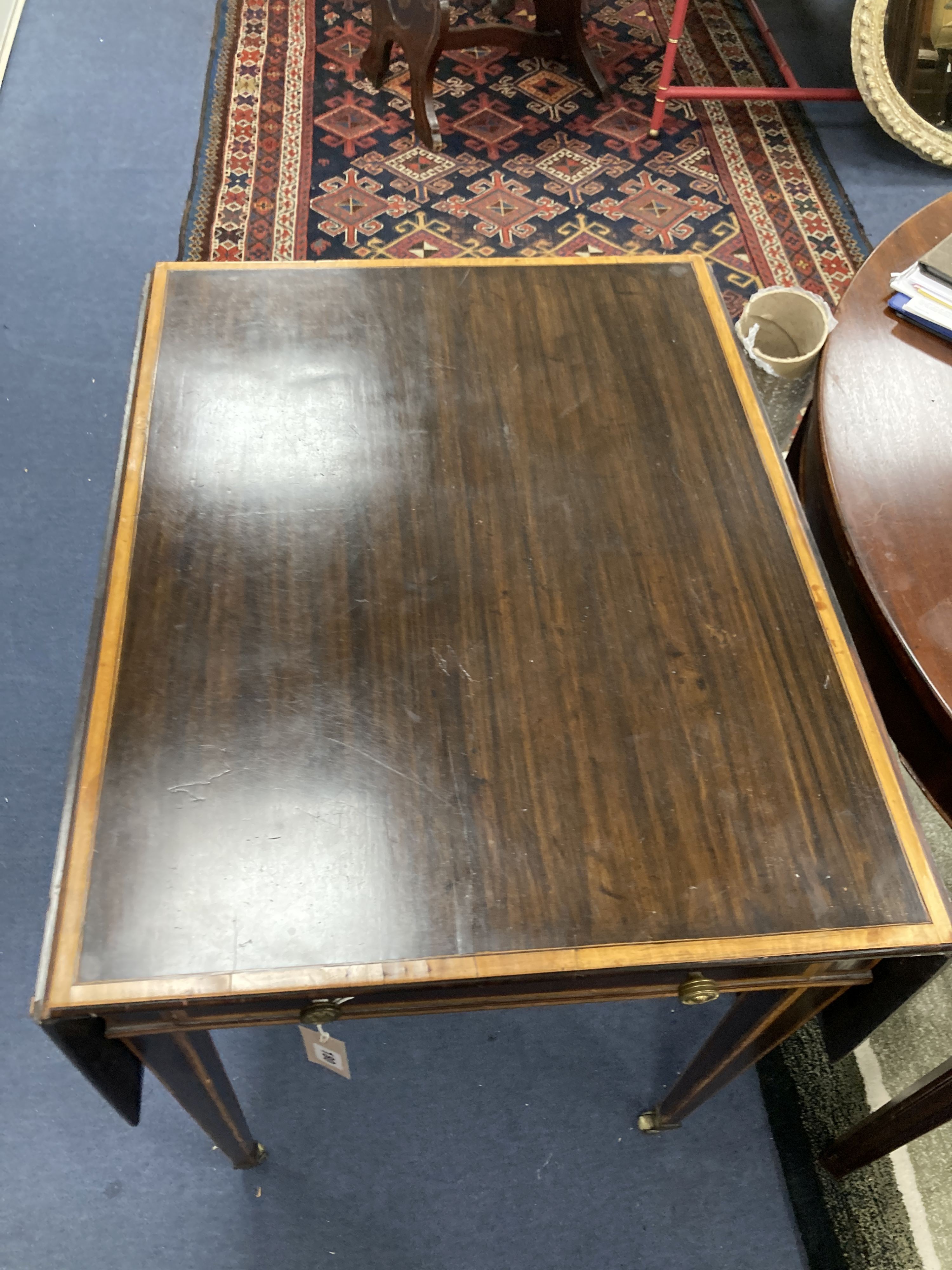 A George III banded rosewood Pembroke table. W-56, D-71, H-73cm.